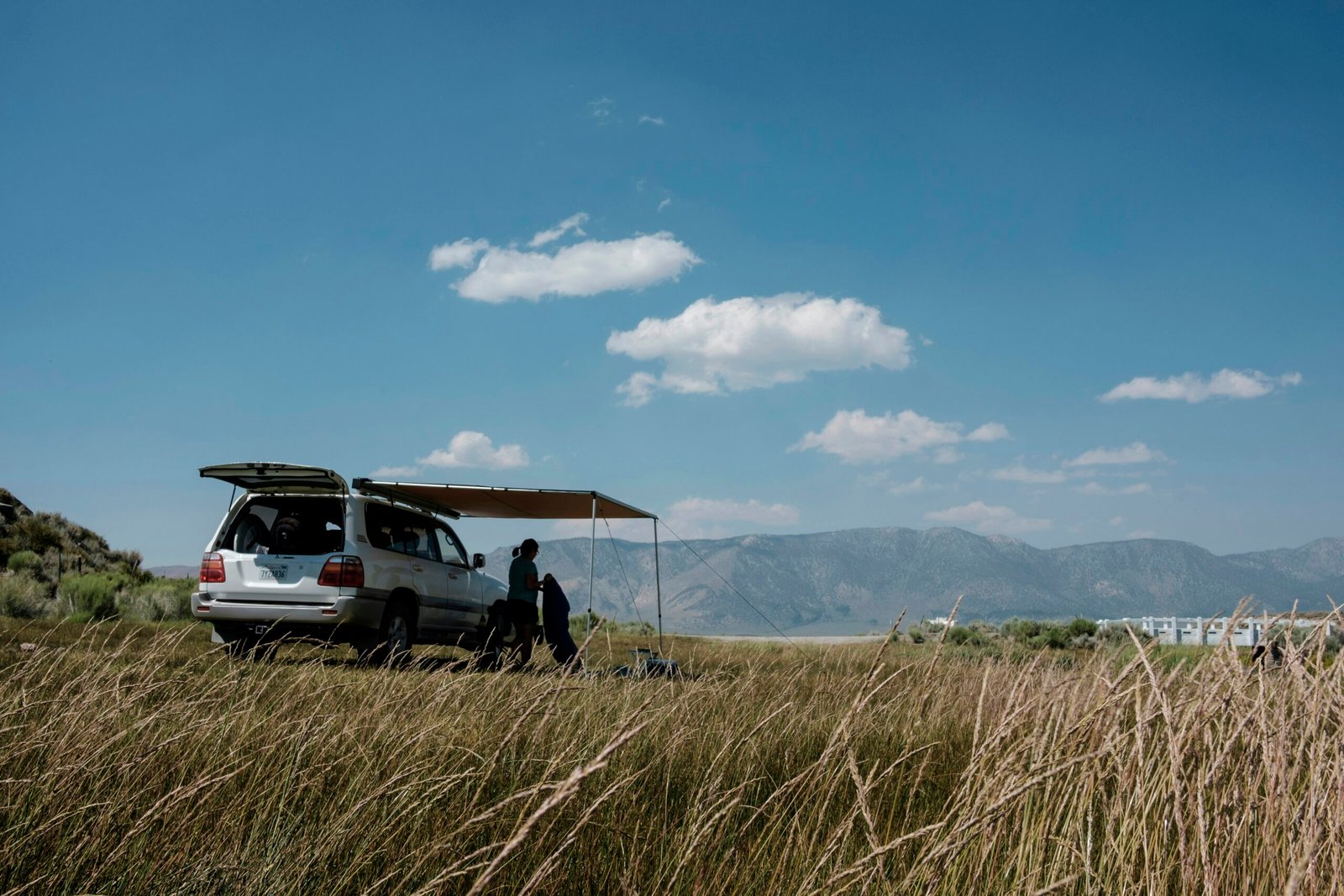 Cleverly designed camper van with Murphy bed, office, and Tesla power system