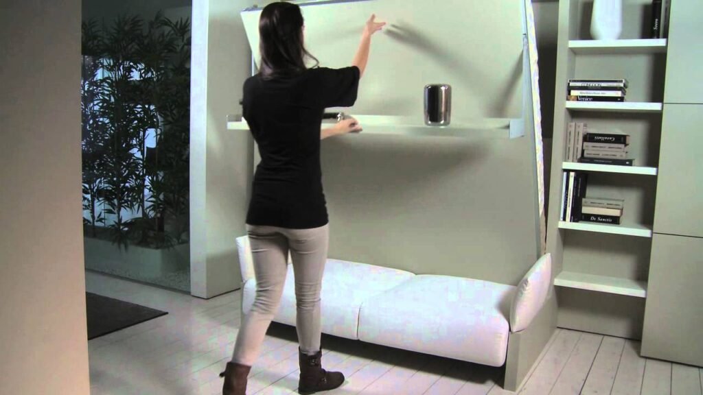 Murphy bed with sofa and bookshelf: Nuovoliolà 10 by Clei